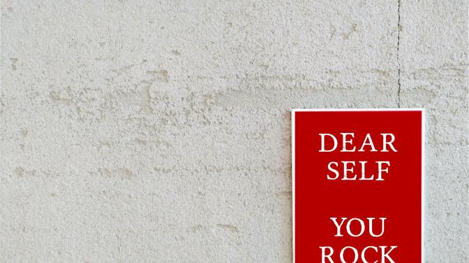 Wall with a sing that reads: 'Dear self: you rock'