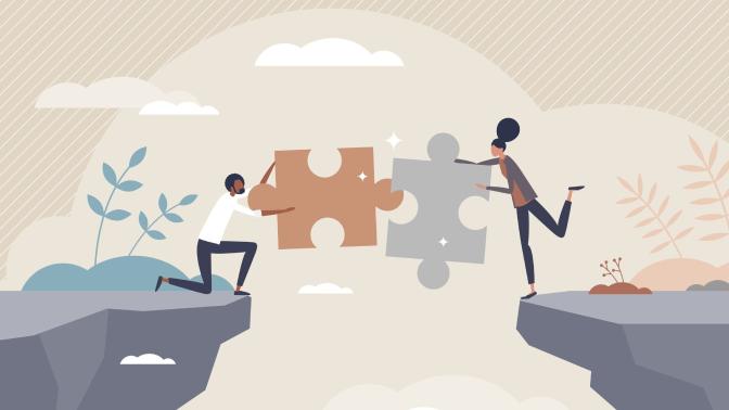 A couple on separate cliffs connecting with oversize jigsaw puzzle pieces