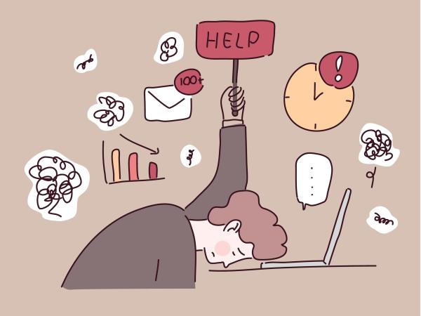 A burnt out office worker holding up a sign that says "Help"